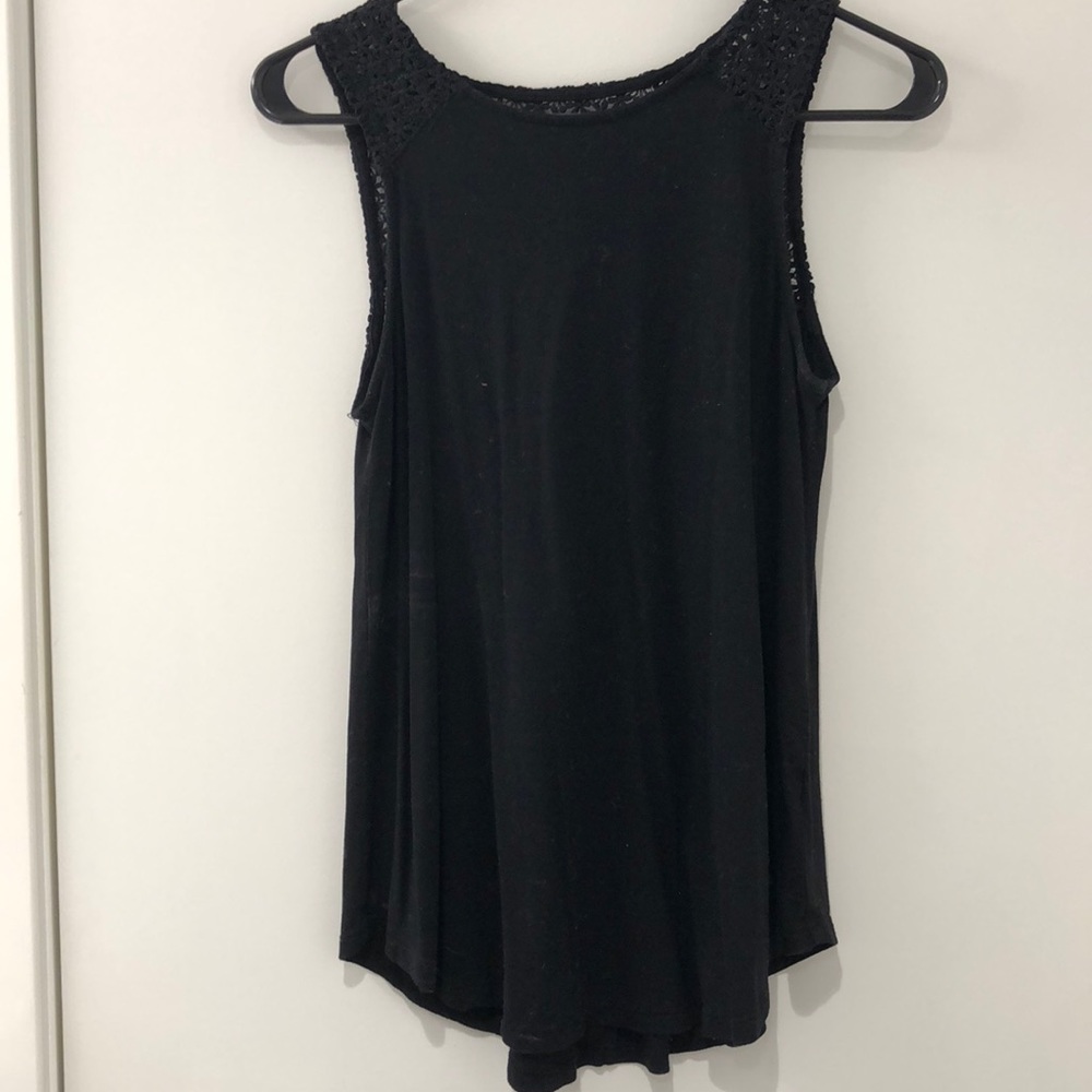Black sleeveless blouse